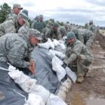 Image result for images: sandbags in floods